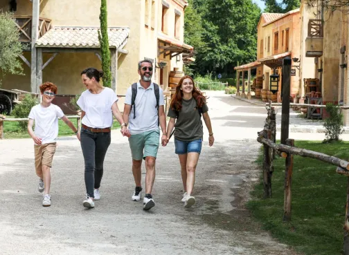 Family strolling through the Gallo-Roman street